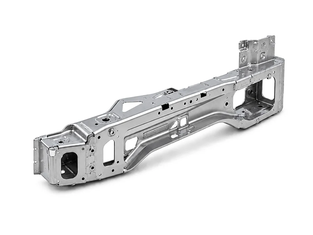 Formed structural component illustrating multi-face metal part geometry