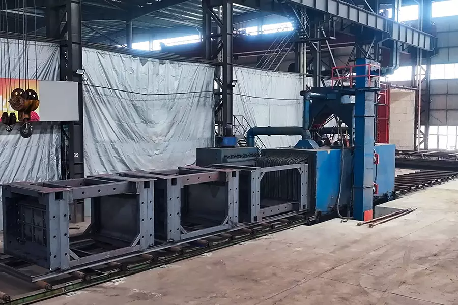 Machine frames at the shot blasting station
