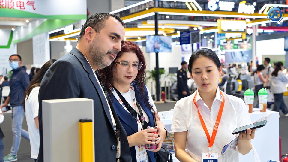 Product Discussion At Ciif 2026 International visitors and Qingyun staff discuss laser-cutting equipment at CIIF 2026